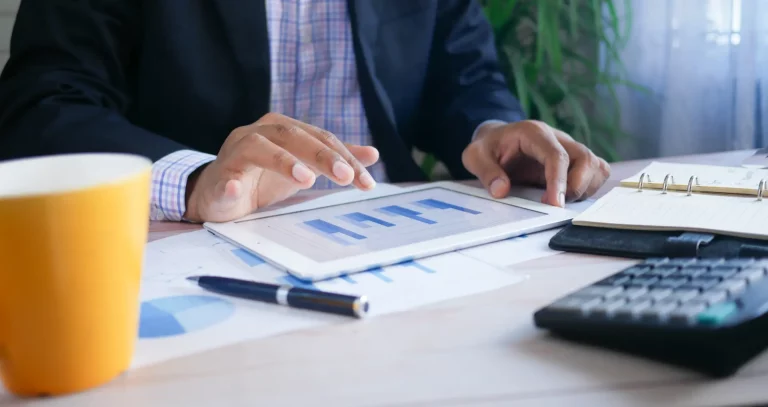 man working out financial property calculations