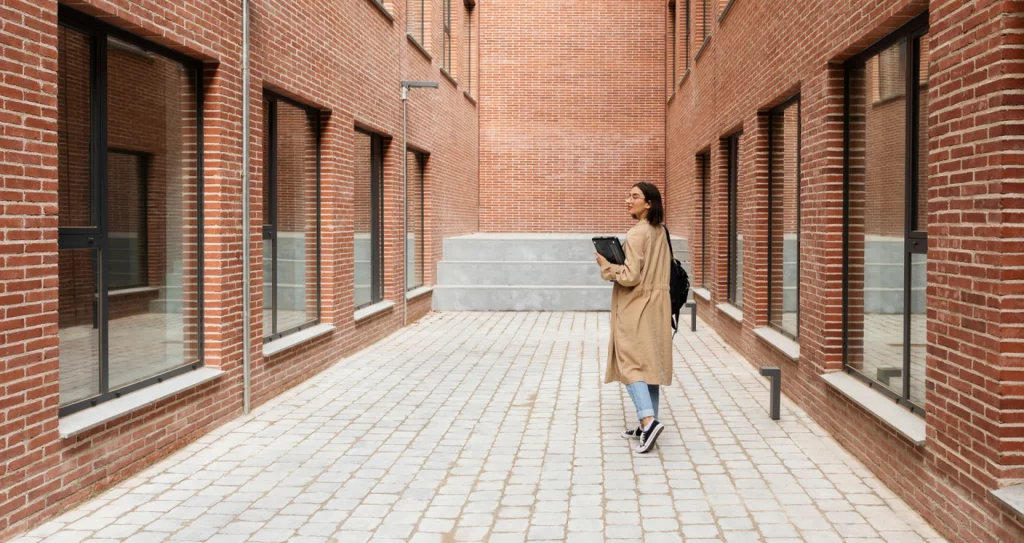 person walking around a buy to let market property