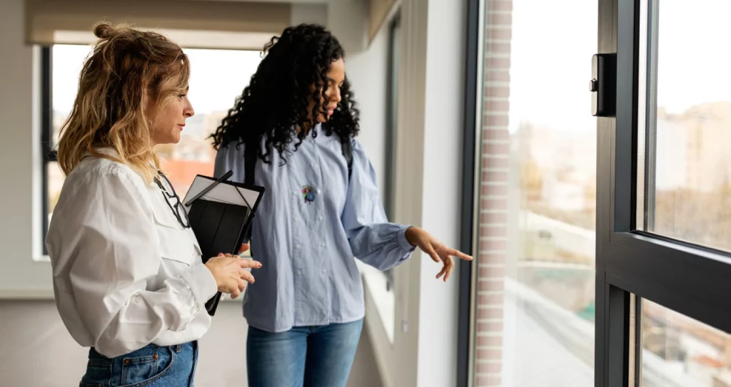 2 people viewing a buy to let property 