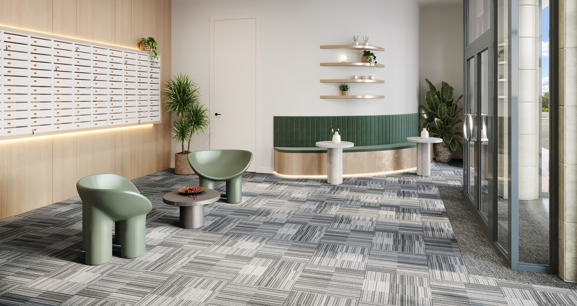 Inside the lakeside development lobby area, featuring mailboxes, chairs and small tables
